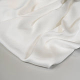 Ivory Faux Acetate Satin — mid-weight double-faced polyester satin with a delustered finish, fluid drape and slight stretch