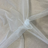 Off White / Silver Glitter Tulle — lightweight and soft, 100% nylon, 150cm wide