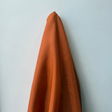 Burnt Orange Habotai — soft with a light, airy drape and a smooth satin finish, 100% mulberry silk, 140cm wide