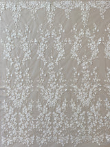 Ivory / Silver Embellished Floral Tulle — featuring floral motifs, hand-beading and sequins, 60% rayon 40% nylon, 140cm wide