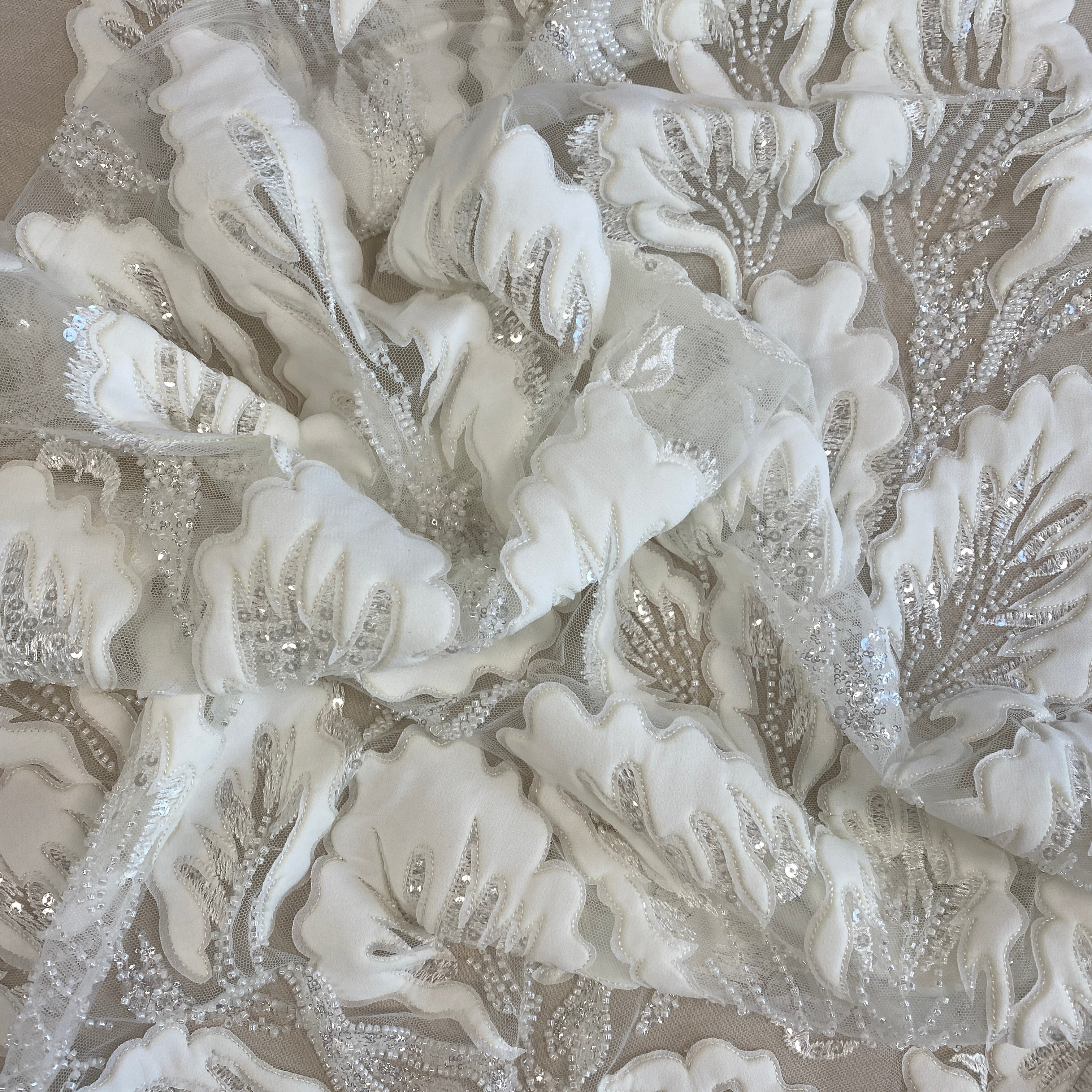 Ivory 3D Floral Tulle — featuring floral motifs, hand-beading and sequins, 50% rayon 50% nylon, 130cm wide