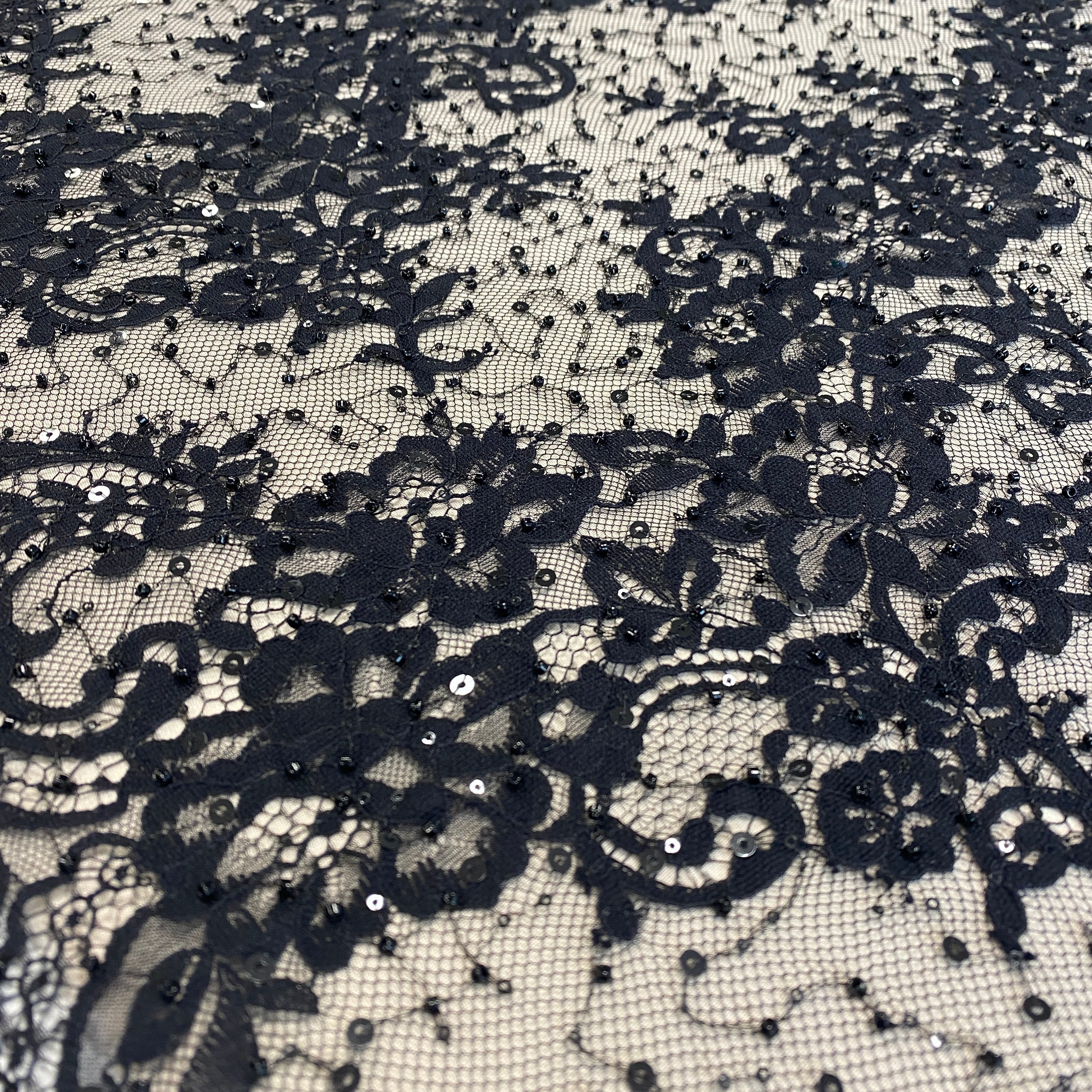 Black Beaded Fine Lace — featuring scalloped edges, eyelash detail and floral motifs, in nylon and viscose, 130cm wide