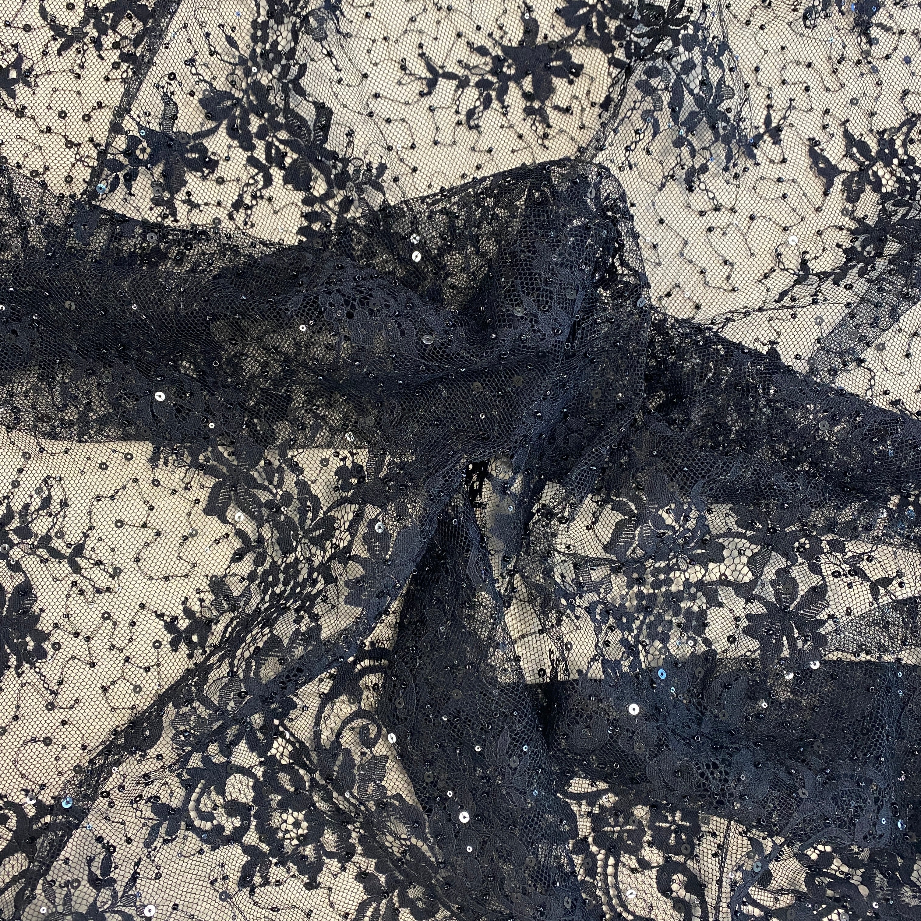 Black Beaded Fine Lace — featuring scalloped edges, eyelash detail and floral motifs, in nylon and viscose, 130cm wide