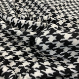 White Italian Wool Tweed — a heavyweight wool-cotton blend tweed with a houndstooth pattern and soft brushed handle, 150cm wide