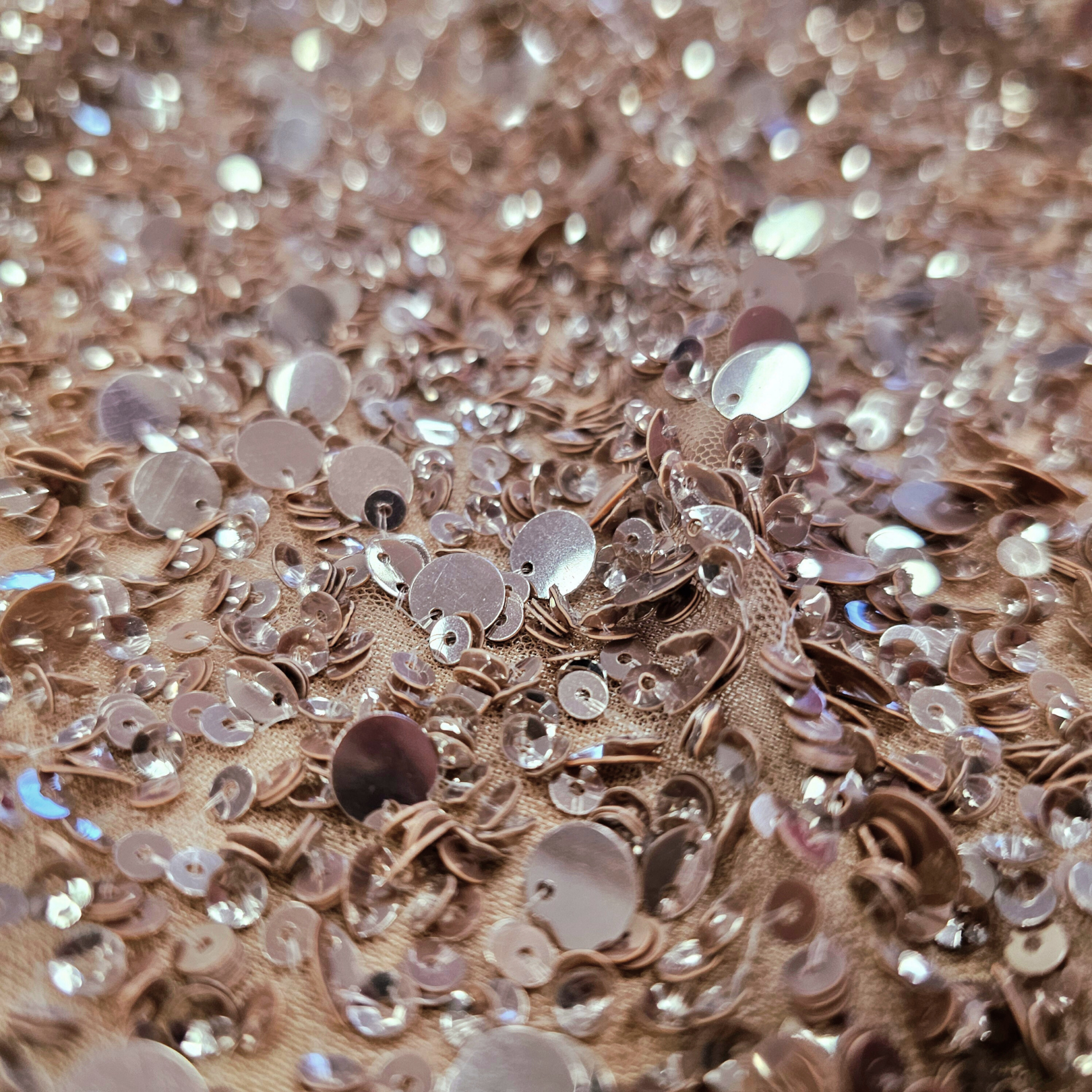 Taupe Sequin Tulle — featuring hand-beading and sequins, 100% nylon, 110cm wide