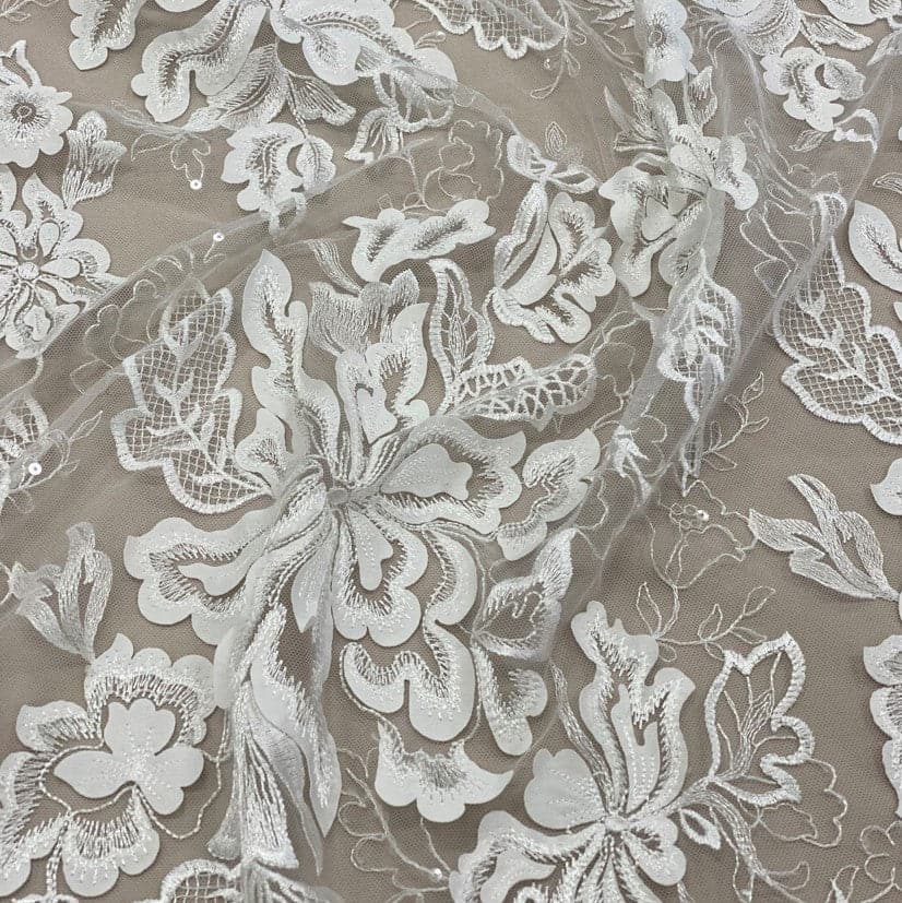 Ivory Embellished Tulle — featuring floral motifs, a border design and sequins, 30% nylon 60% rayon 10% polyester, 130cm wide