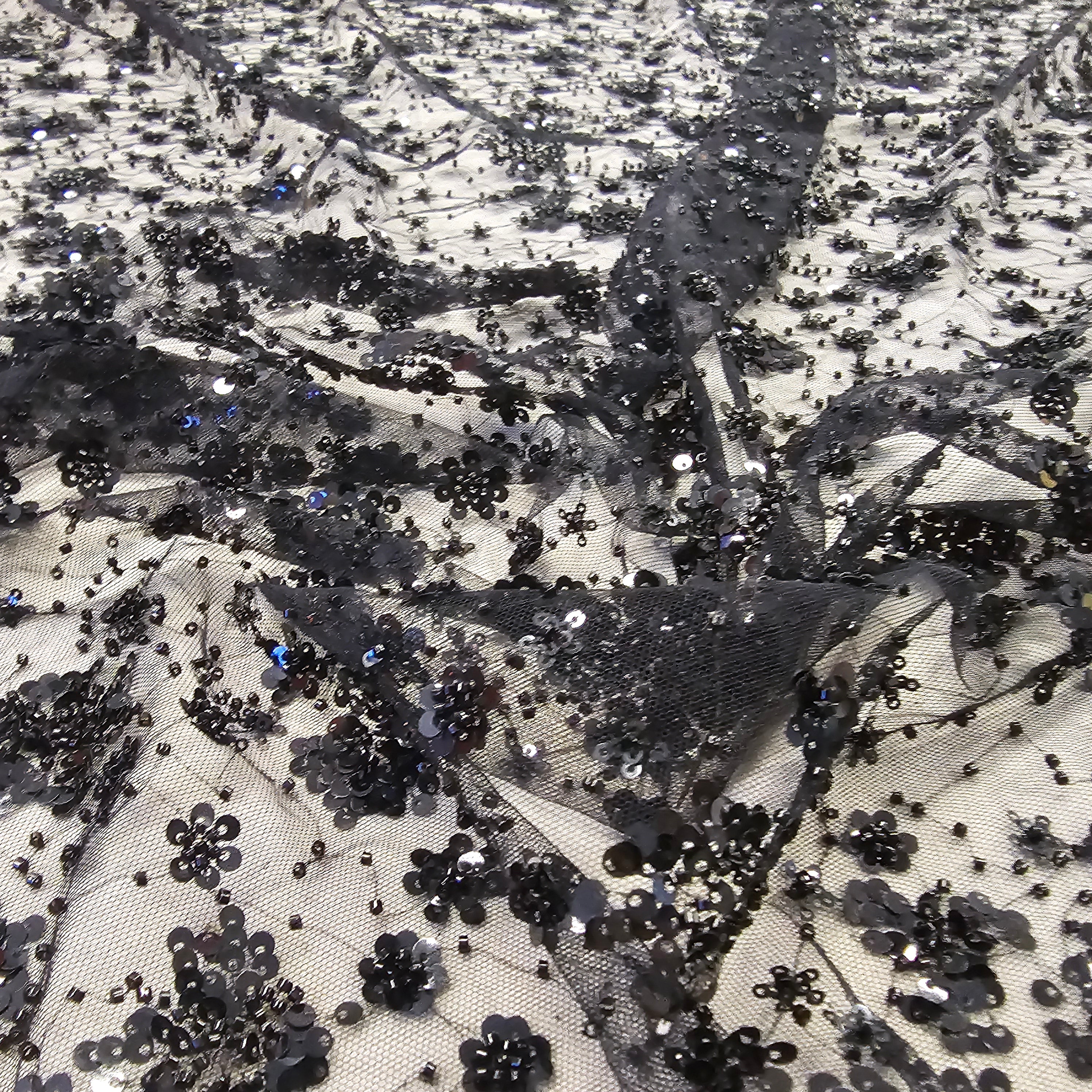 Black Sequin Tulle — featuring hand-beading and sequins, 50% rayon 50% nylon, 130cm wide