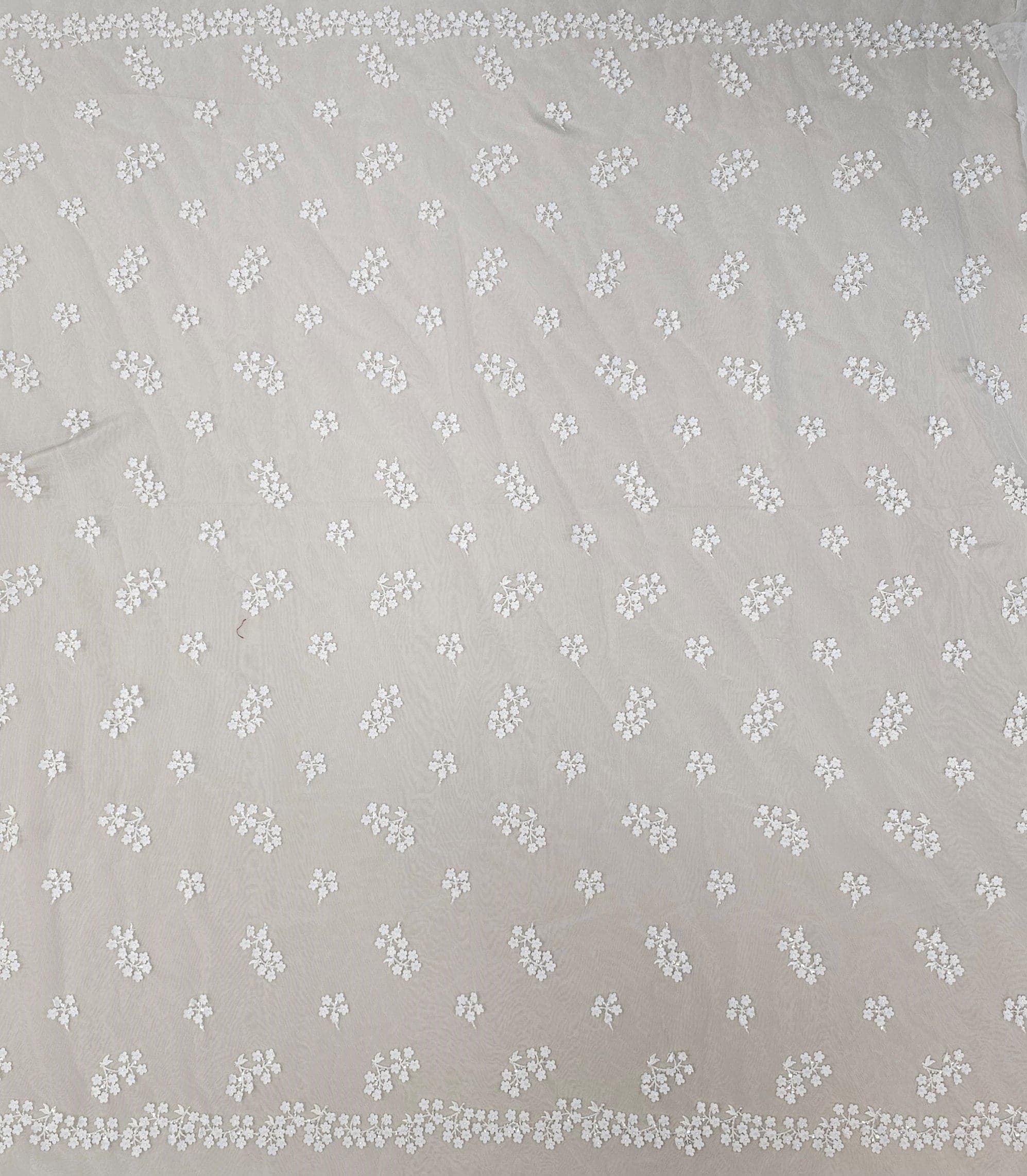 Ivory 3D Floral Tulle — featuring floral motifs, a 3D floral design and a border design, 50% nylon 50% rayon, 130cm wide
