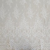 Ivory Fine Floral Lace — featuring scalloped edges, eyelash detail and floral motifs, 130cm wide
