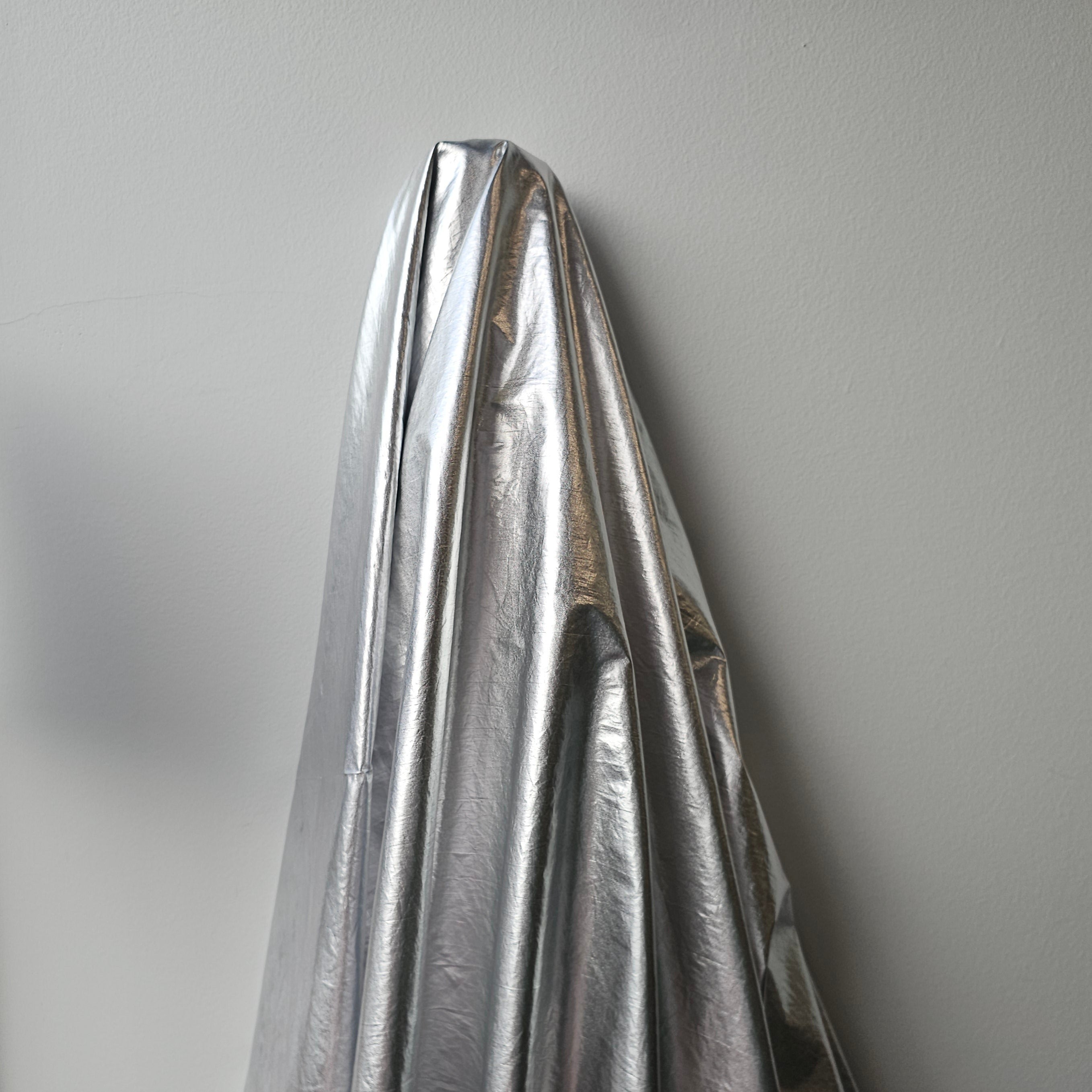 Silver Metallic Crushed Foil — a crushed fabric with a metallic foil finish