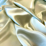 Sage Sandwash Satin — lightweight and soft with a smooth luster satin finish, 100% mulberry silk, 140cm wide