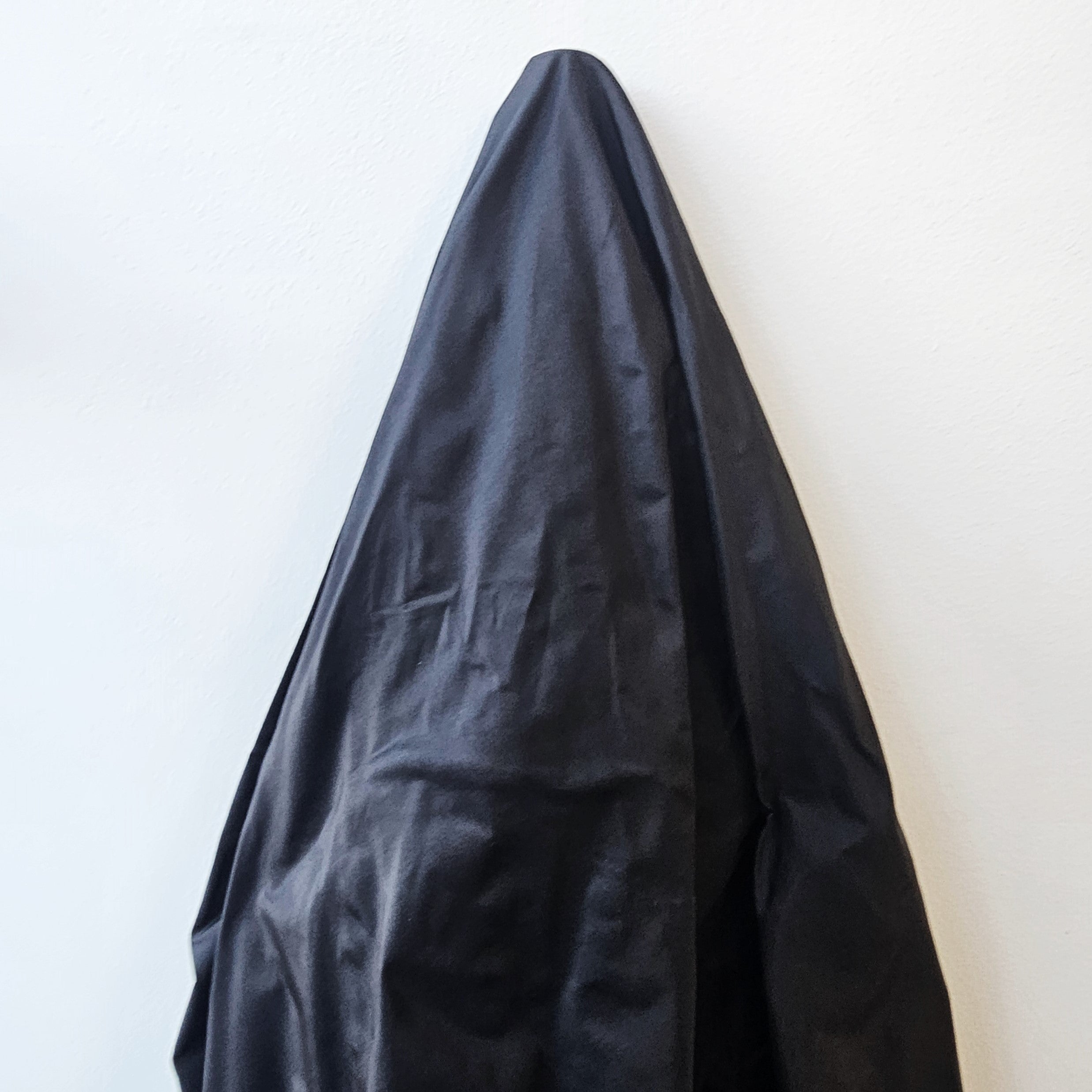 Black Taffeta — a mid-weight silk taffeta with a smooth texture and crisp handle, 100% silk