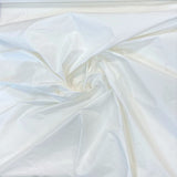 White Taffeta — a mid-weight silk taffeta with a smooth texture and crisp handle, 100% silk