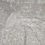 Ivory Embroidered Tulle — featuring a border design, 50% nylon 50% rayon, 135cm wide