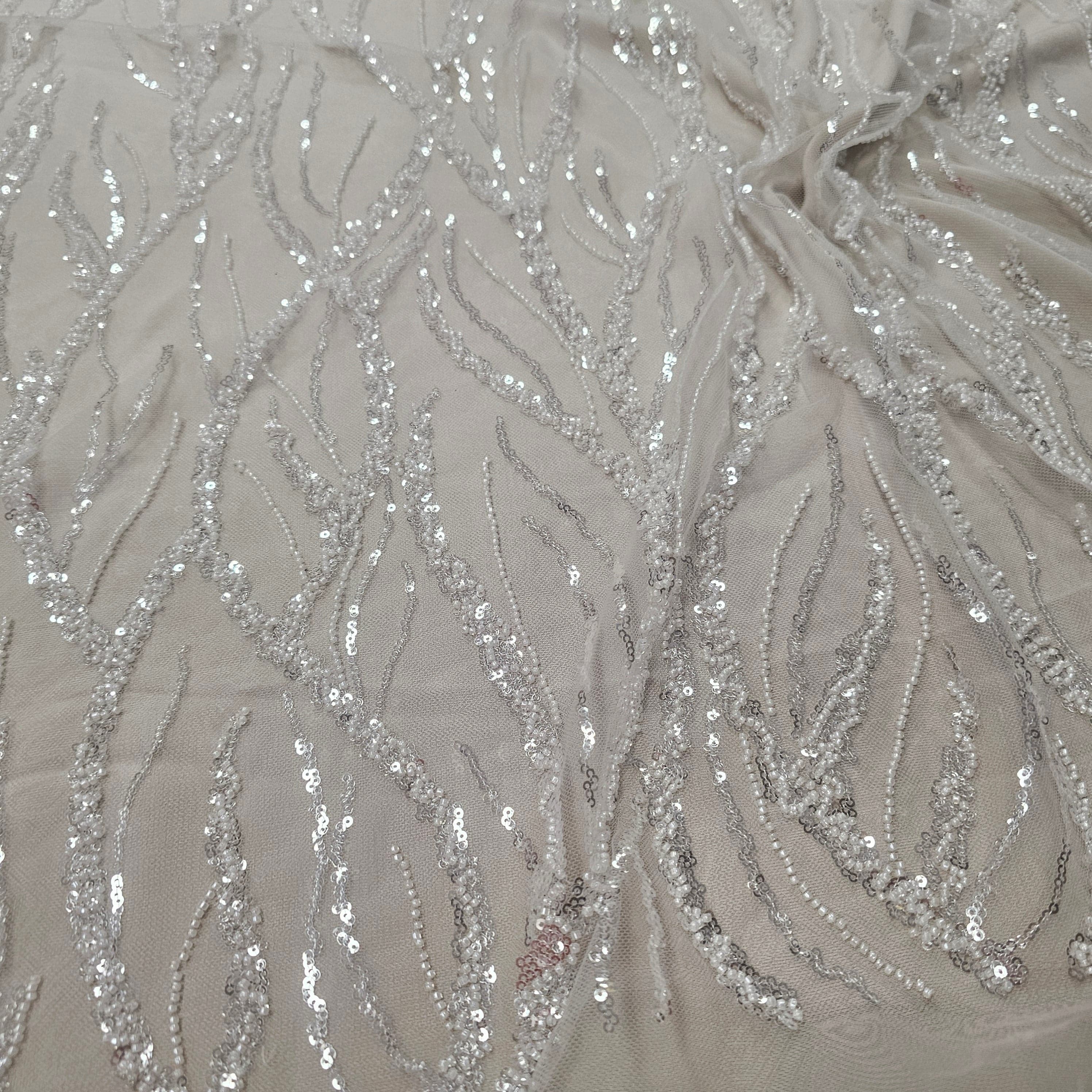 Ivory Embellished Tulle — featuring hand-beading and sequins, 60% rayon 40% nylon, 140cm wide