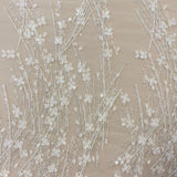 Ivory / Silver 3D Floral Blossom Embroidered Tulle — featuring floral motifs, a 3D floral design and hand-beading, 60% rayon 40% nylon, 140cm wide