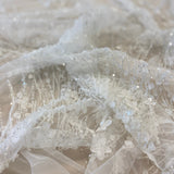Ivory / Silver 3D Floral Blossom Embroidered Tulle — featuring floral motifs, a 3D floral design and hand-beading, 60% rayon 40% nylon, 140cm wide