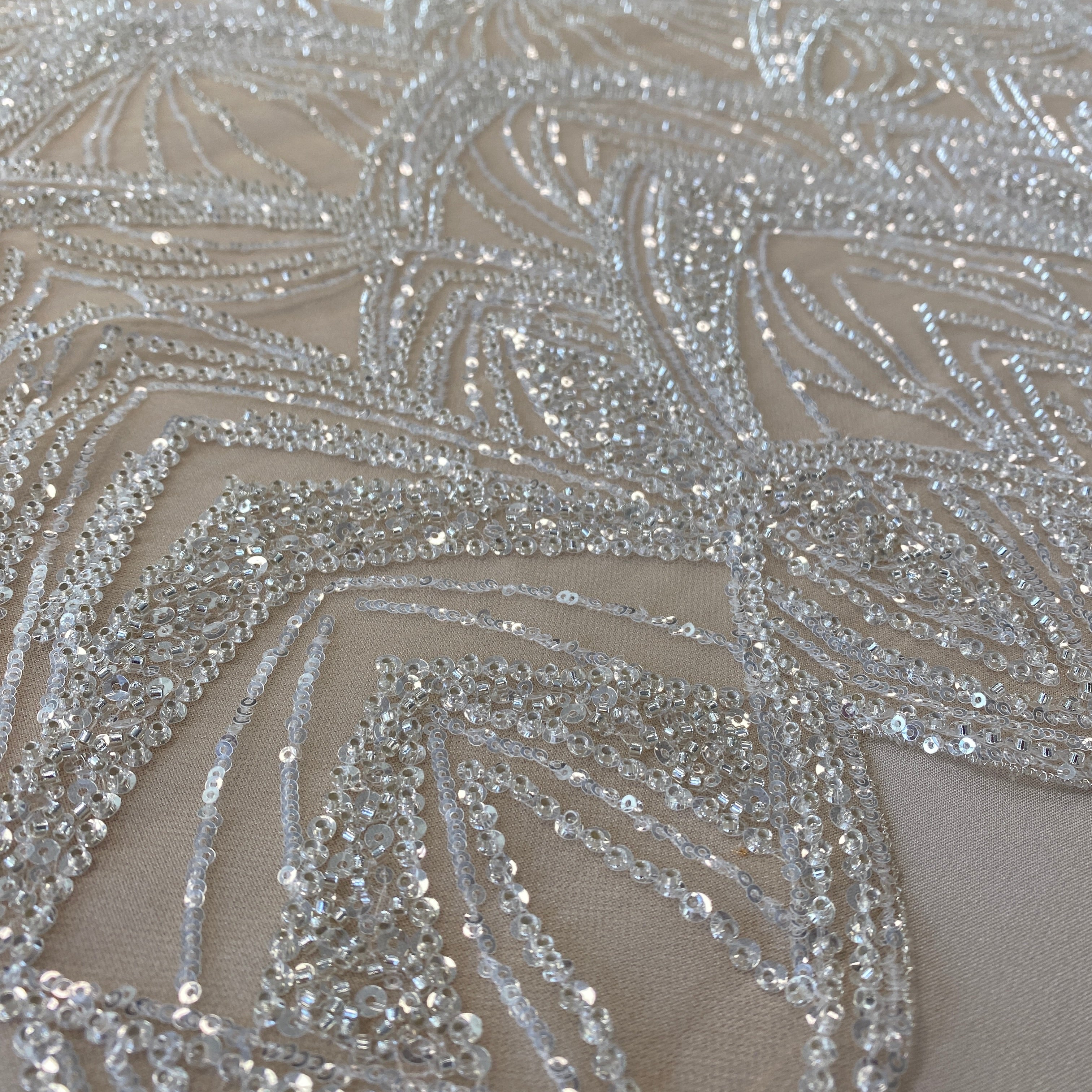 Champagne Embellished Tulle — featuring scalloped edges and hand-beading, 60% rayon 40% nylon, 130cm wide