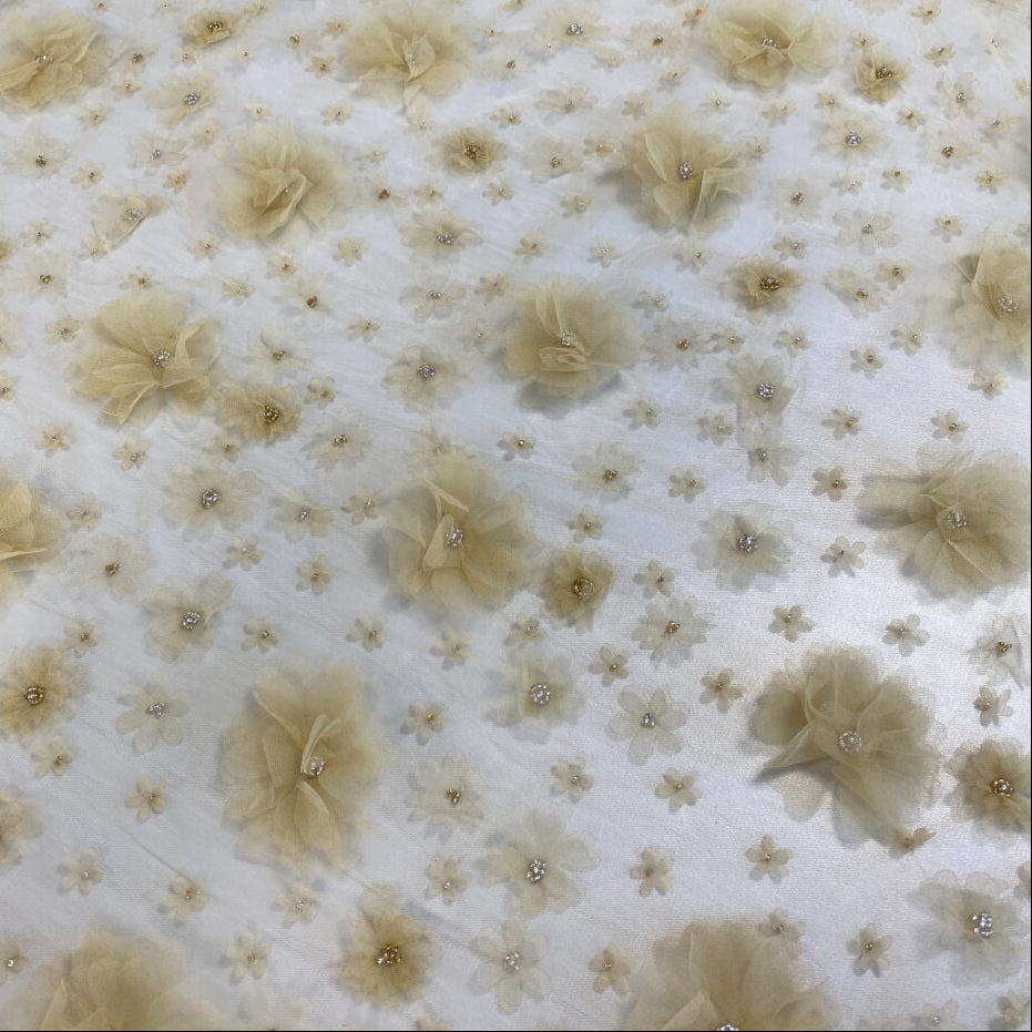 Butter Embellished 3D Tulle — featuring floral motifs, a 3D floral design and hand-beading, 100% nylon, 140cm wide