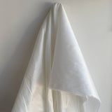 Ivory Polyester Dupion — mid-weight and crisp with a lightly slubbed texture, 100% polyester, 140cm wide