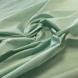Mint Polyester Dupion — mid-weight and crisp with a lightly slubbed texture, 100% polyester, 140cm wide