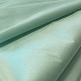 Mint Polyester Dupion — mid-weight and crisp with a lightly slubbed texture, 100% polyester, 140cm wide