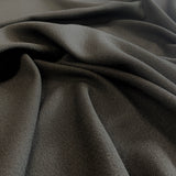 Black Wool Crepe — a medium-weight wool-blend crepe suiting with a soft handle, 137cm wide