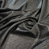 Black Metallic Jacquard — featuring a woven metallic jacquard design with a soft feel and stiff drape, 140cm wide