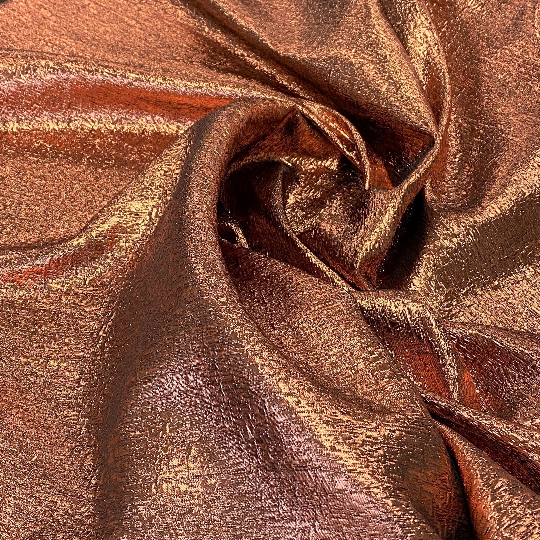 Redwood Metallic Jacquard — featuring a woven metallic jacquard design with a soft feel and stiff drape, 140cm wide