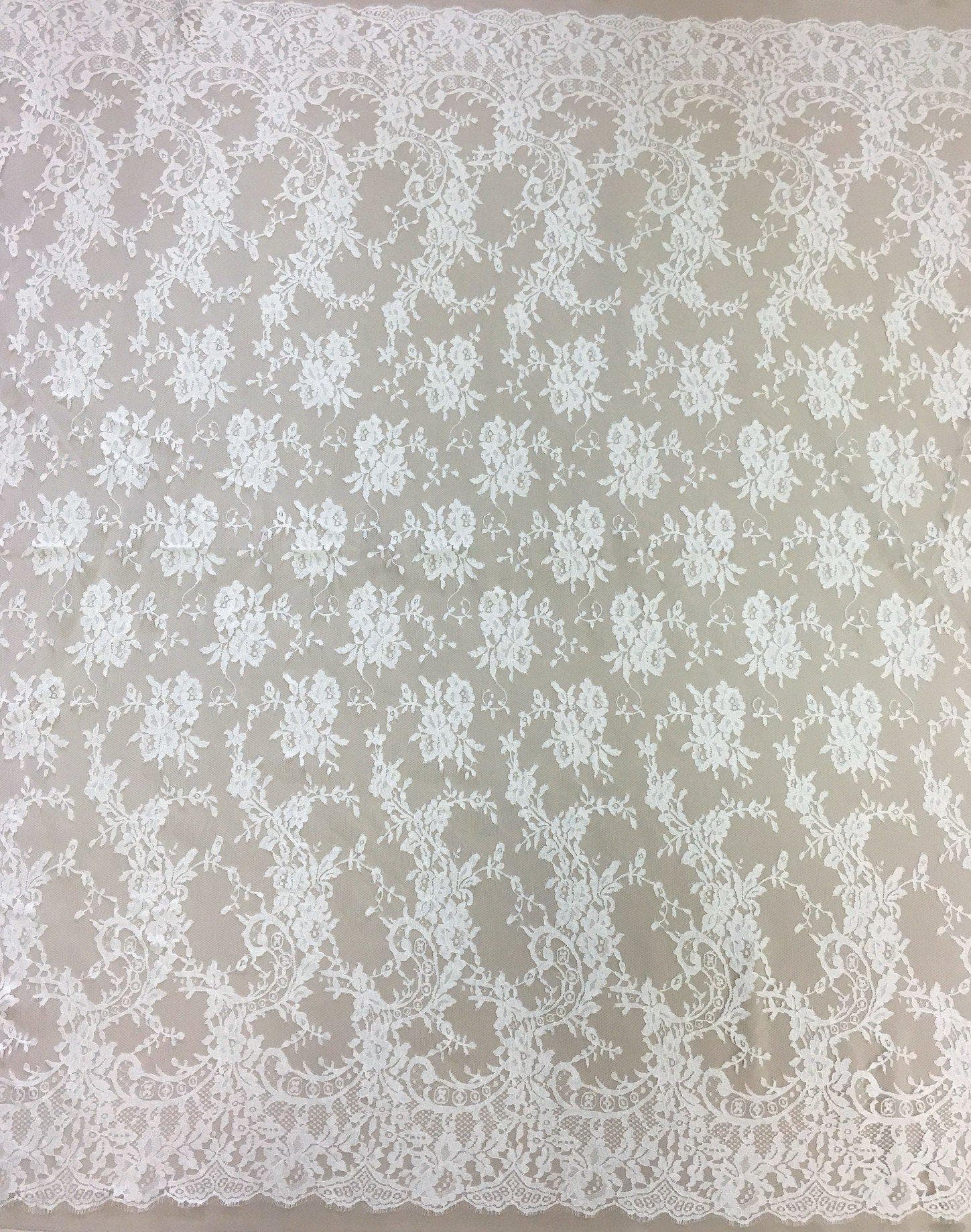 Ivory Fine Chantilly lace — featuring scalloped edges, eyelash detail and floral motifs, in viscose, 135cm wide