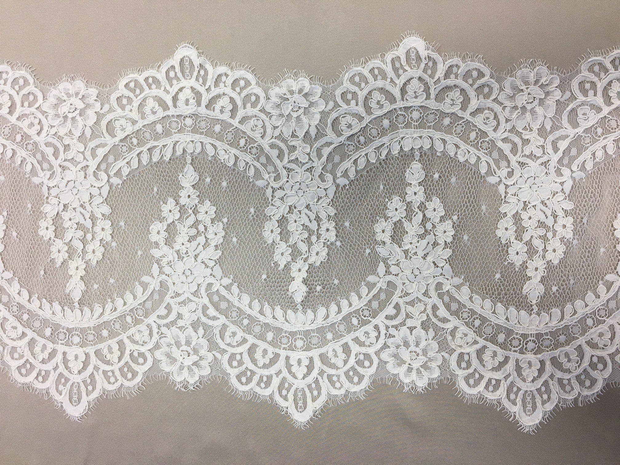 Ivory Corded Abloom lace trim — featuring scalloped edges, floral motifs and a corded texture, in nylon and viscose, 30cm wide