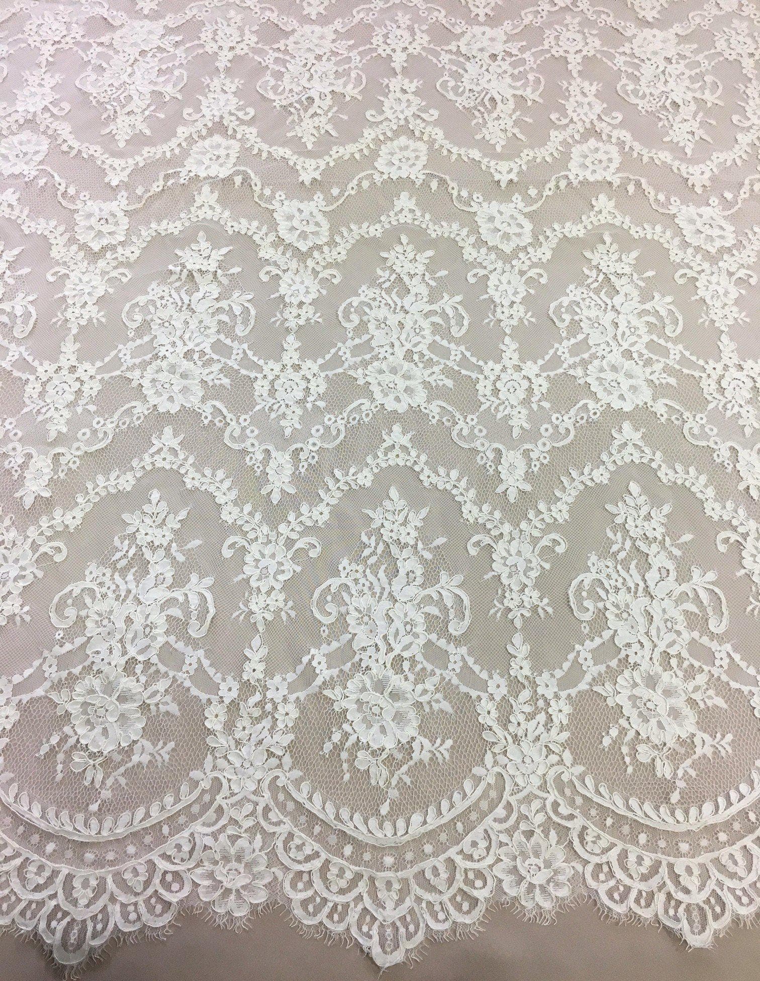 Ivory Abloom Corded Lace — featuring scalloped edges, floral motifs and a corded texture, in nylon and viscose, 130cm wide