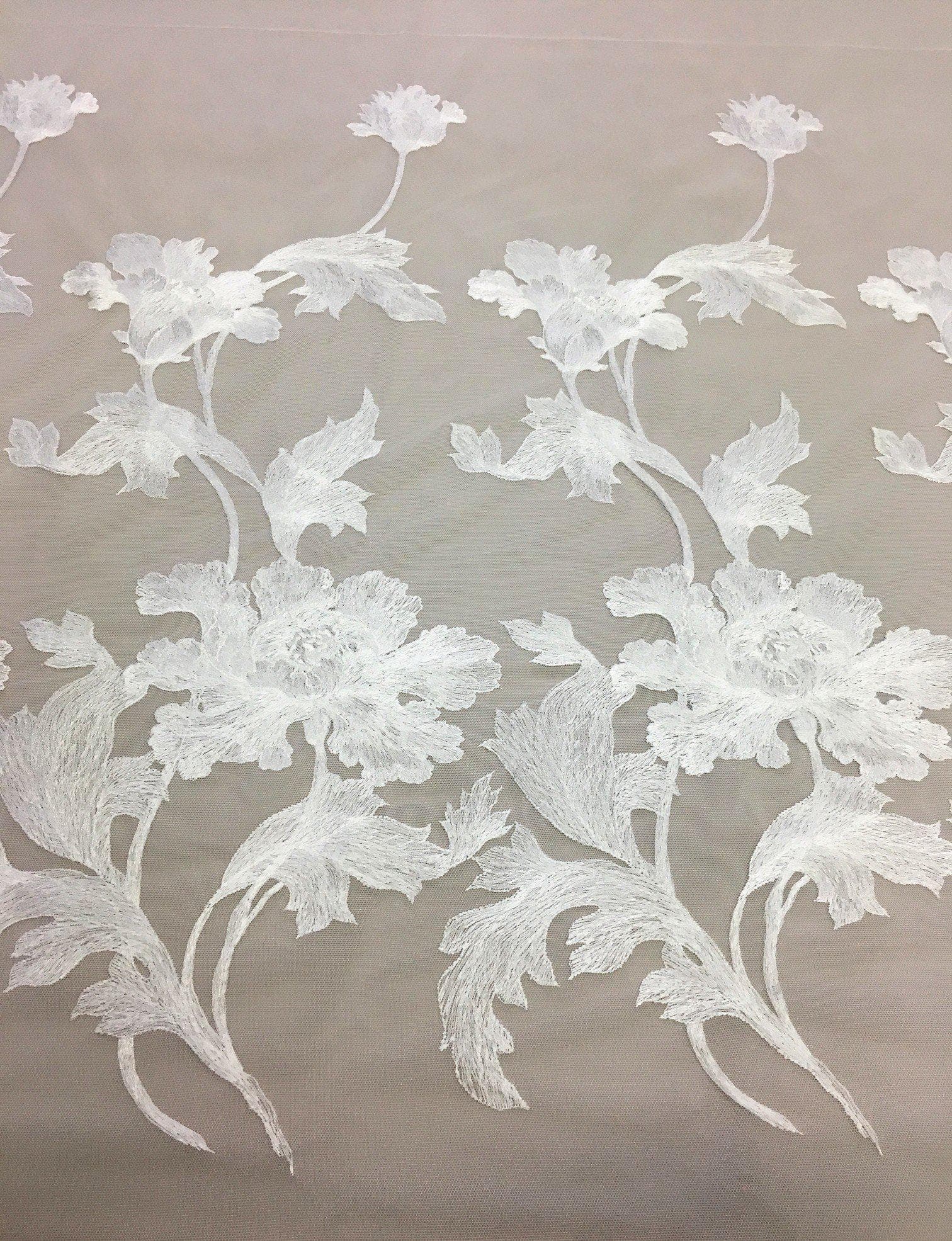 Ivory Large Floral Border Embroidered Tulle — featuring floral motifs and a border design, 55% nylon 45% rayon, 150cm wide