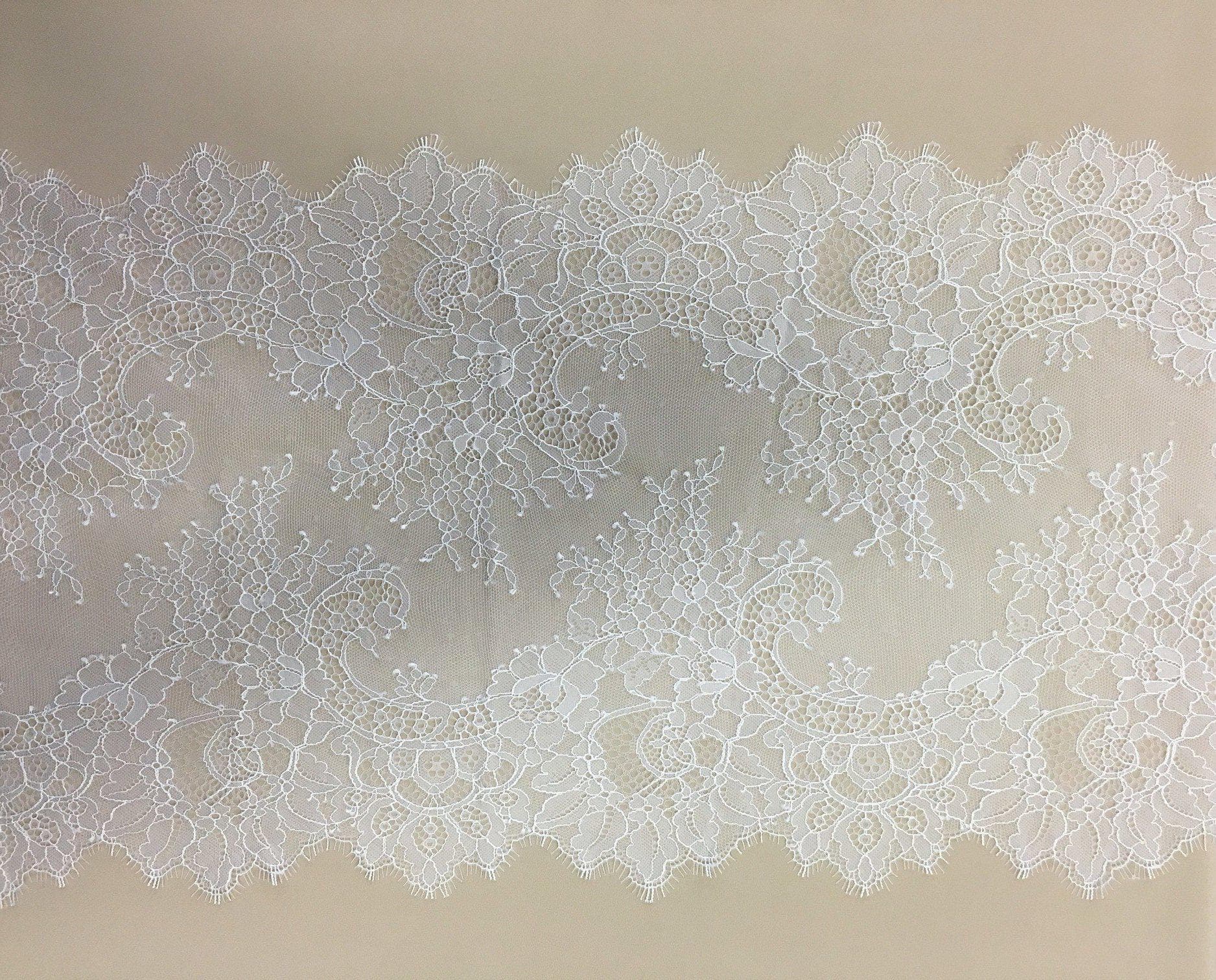 White Fine lace trim — featuring scalloped edges, eyelash detail and floral motifs, in nylon, 34cm wide