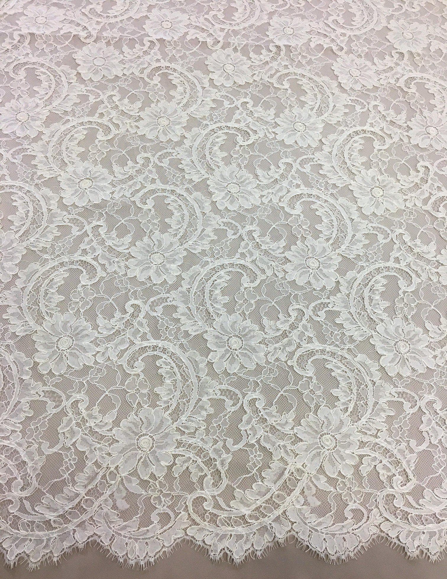 Ivory Floral Corded Lace — featuring scalloped edges, floral motifs and a corded texture, in nylon and viscose, 130cm wide