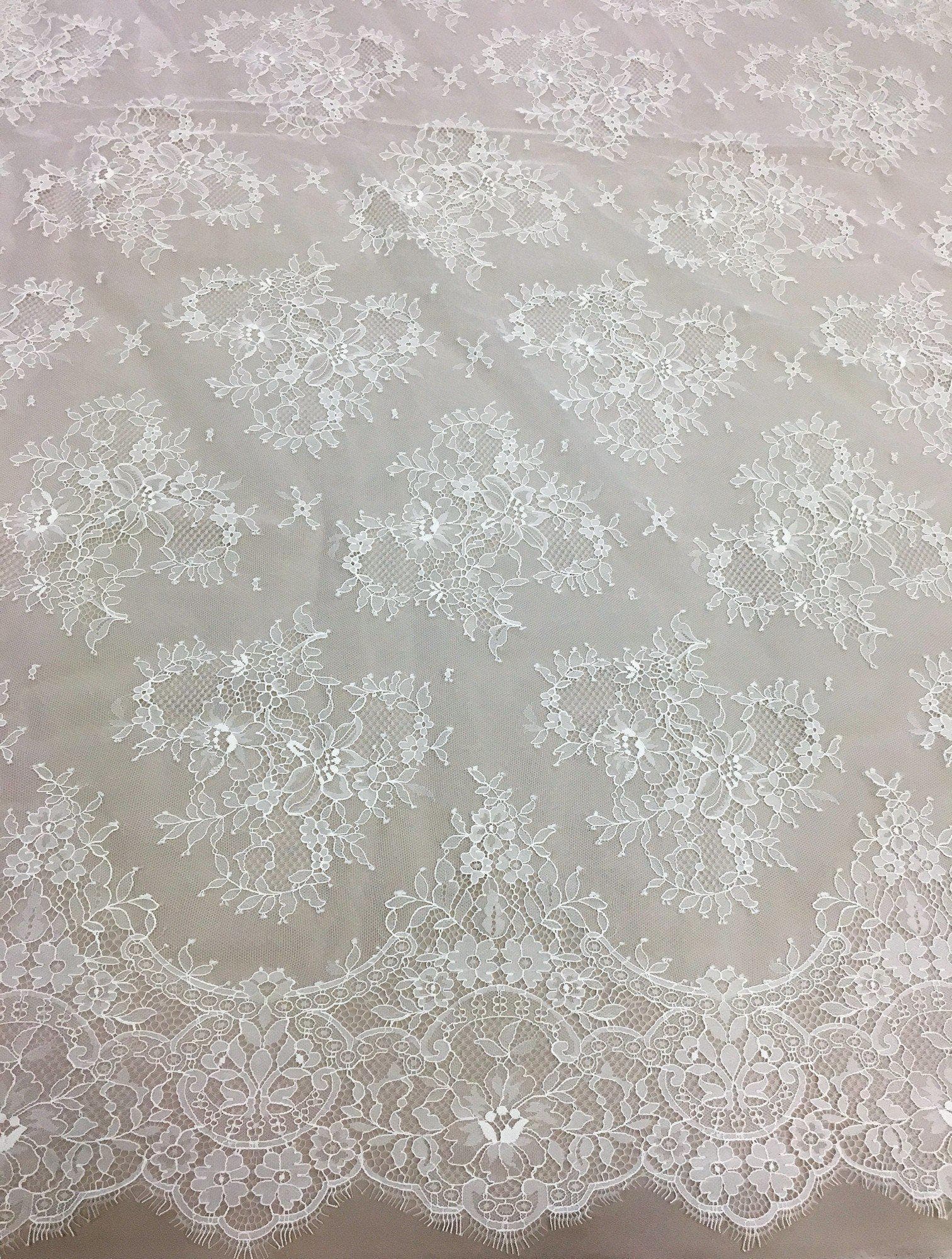 Ivory Delicate Floral Lace — featuring scalloped edges and floral motifs, in nylon, 140cm wide