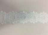 Ivory Fine floral lace trim — featuring scalloped edges, eyelash detail and floral motifs, in nylon, 13cm wide