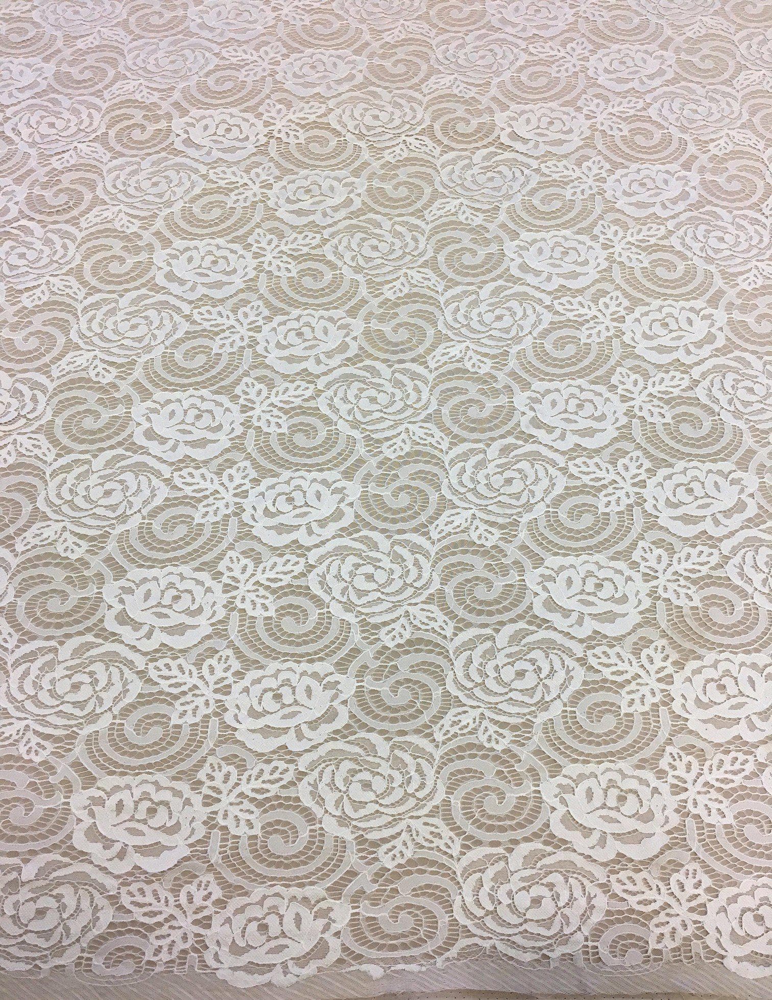 Ivory Spiral Rosette Fine Lace — featuring rosette motifs and scrolling swirls, in nylon, 140cm wide