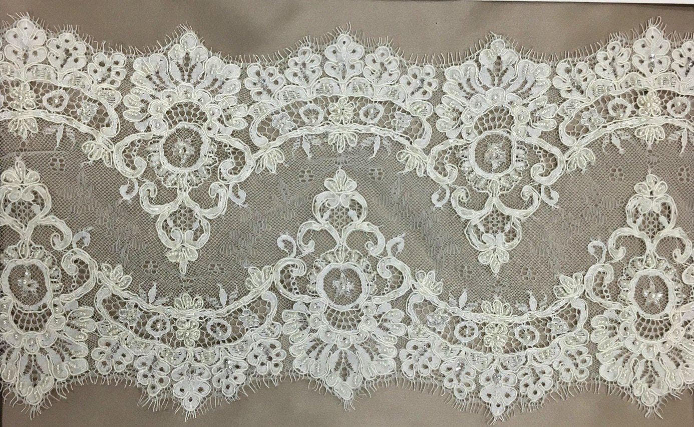 Ivory Beaded Lace Trim — featuring scalloped edges, eyelash detail and floral motifs, in nylon and viscose, 25cm wide
