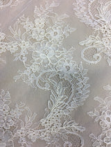 Ivory Fine Corded Lace — featuring scalloped edges, floral motifs and a corded texture, in nylon, 140cm wide