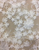 White 3D Floral Lace — featuring scalloped edges, floral motifs and a 3D floral design, in nylon and viscose, 130cm wide