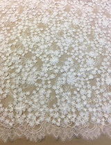 White 3D Floral Lace — featuring scalloped edges, floral motifs and a 3D floral design, in nylon and viscose, 130cm wide