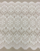 Ivory Fine Floral Lace — featuring scalloped edges and floral motifs, in cotton and nylon, 140cm wide