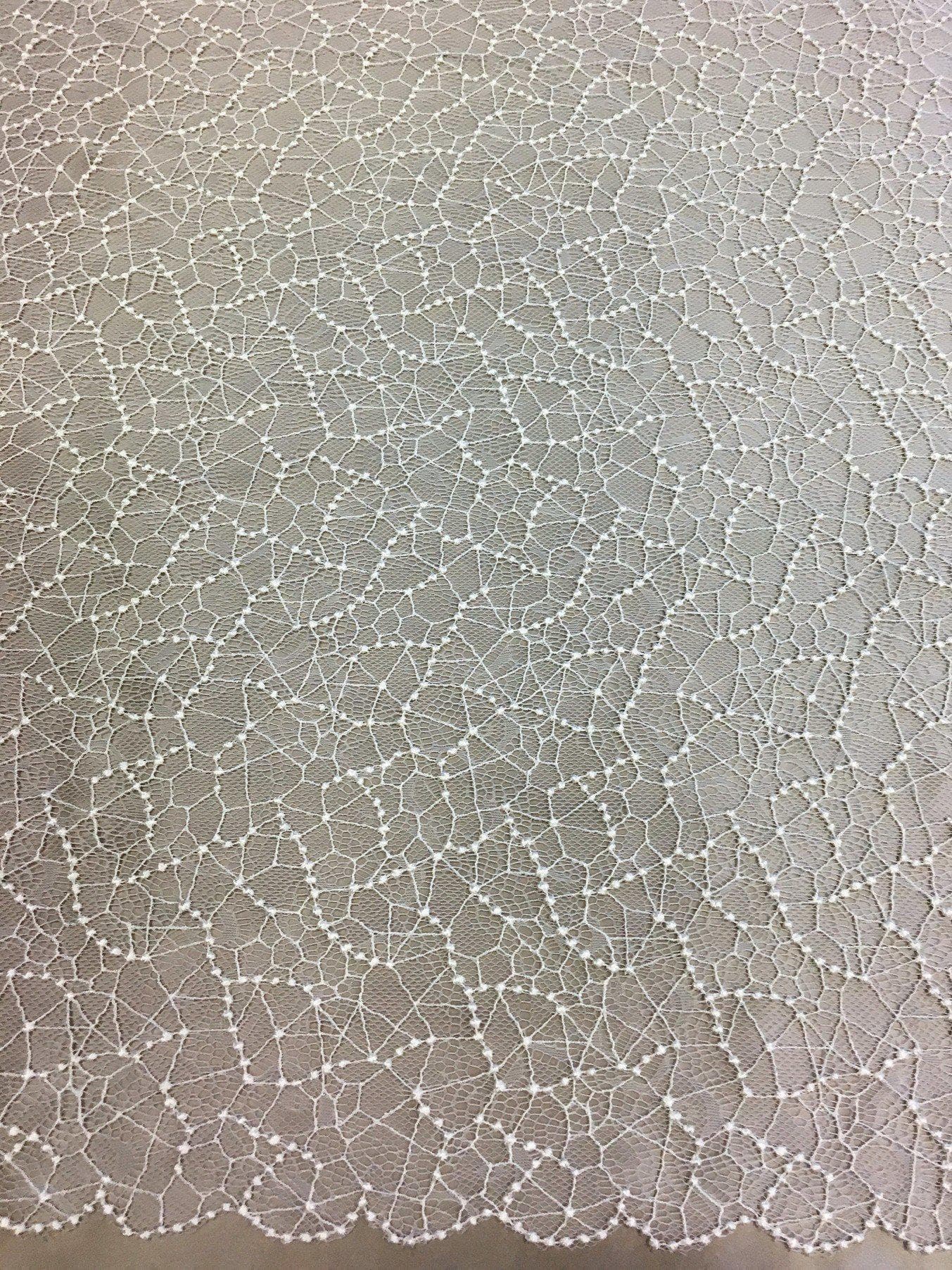 Ivory Abstract Fine Lace — featuring scalloped edges and an abstract web-like design, in nylon, 95cm wide