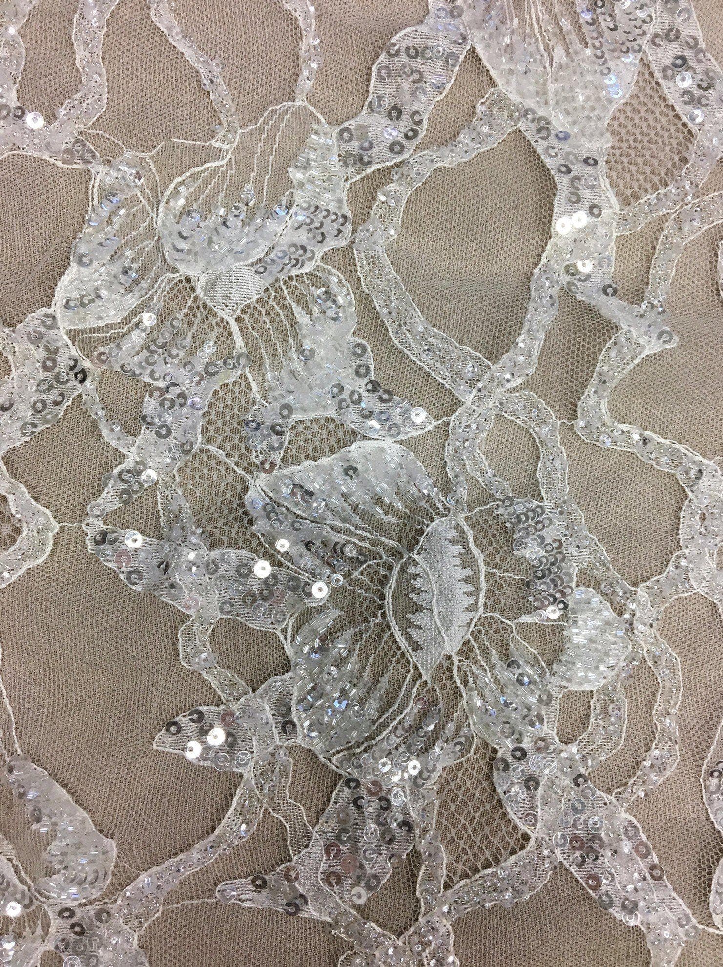 Ivory Beaded Floral Lace — featuring scalloped edges, floral motifs and hand-beading, 130cm wide