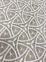 Ivory Guipure Lace — featuring Guipure motifs and geometric motifs, 120cm wide