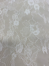 Ivory Fine Lace — featuring scalloped edges and floral motifs, in viscose and nylon, 140cm wide