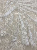 Ivory Fine Lace — featuring scalloped edges and floral motifs, in viscose and nylon, 140cm wide