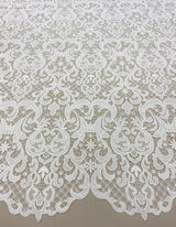 Ivory Filigree Guipure Lace — featuring scalloped edges, filigree scrollwork and paisley motifs, 120cm wide