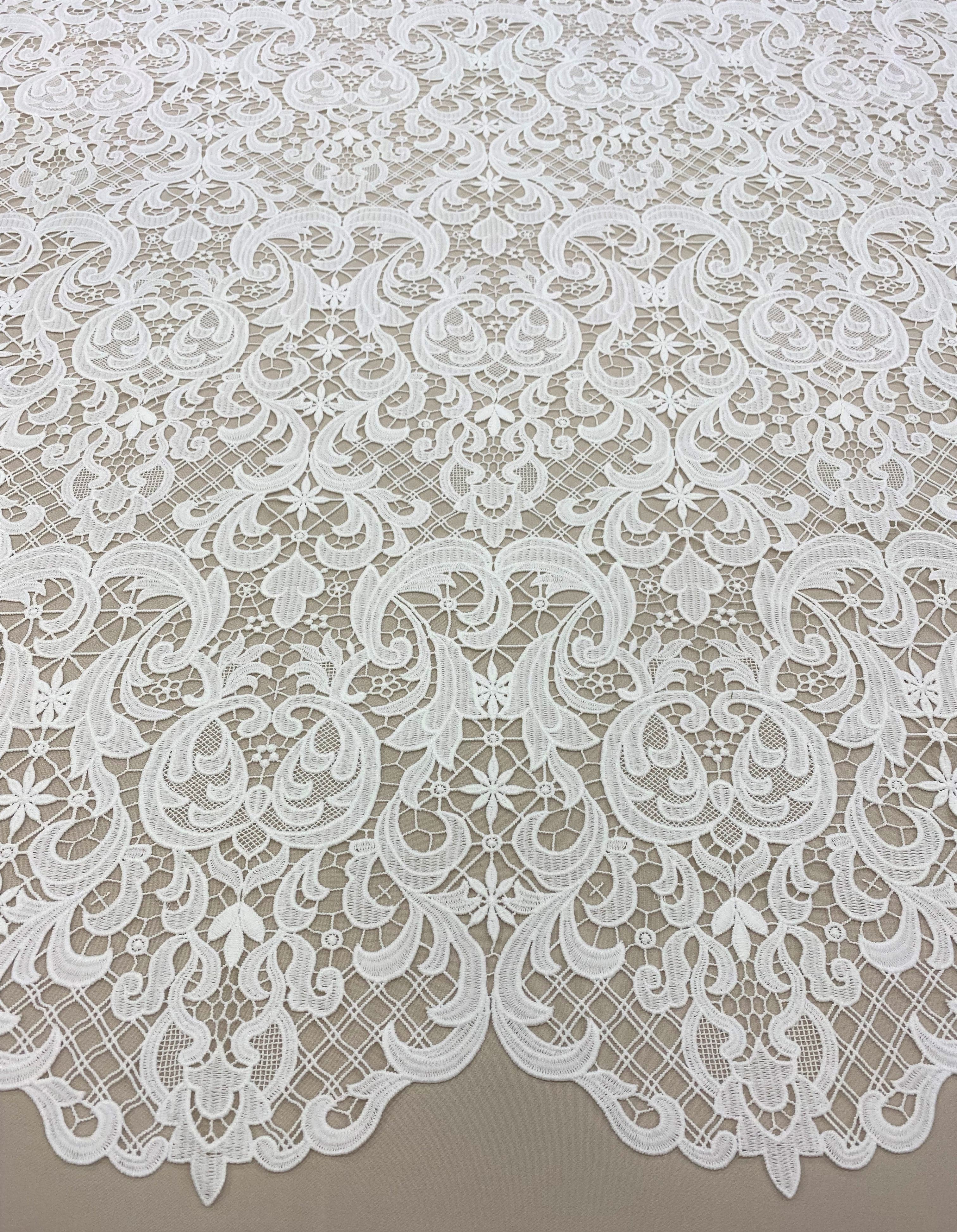 Ivory Filigree Guipure Lace — featuring scalloped edges, filigree scrollwork and paisley motifs, 120cm wide